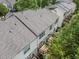 Aerial view of townhouse complex with decks and lush green surroundings at 214 Cedar Elm Rd, Durham, NC 27713