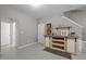 Basement space with custom wet bar and cabinetry, next to a stairwell at 214 Cedar Elm Rd, Durham, NC 27713