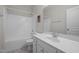 Clean bathroom with a shower-tub combo and single sink vanity at 214 Cedar Elm Rd, Durham, NC 27713