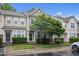 Charming townhouse with meticulously maintained landscaping, neutral exterior, and welcoming entrance at 214 Cedar Elm Rd, Durham, NC 27713