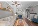 Cozy living room with modern decor, wood floors, and inviting seating at 214 Cedar Elm Rd, Durham, NC 27713