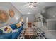 Spacious living room featuring unique decor and a geometric-patterned rug at 214 Cedar Elm Rd, Durham, NC 27713