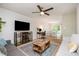 Open living space with TV, desk, and dining area visible, creating a functional and connected layout at 2216 Lawrence Dr, Raleigh, NC 27603