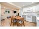 Open living space with a view of the kitchenette, promoting easy flow and modern living at 2216 Lawrence Dr, Raleigh, NC 27603