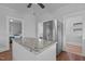 Eat in Kitchen boasting granite countertops and stainless steel refrigerator at 2227 Us-15, Creedmoor, NC 27522