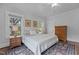 Main bedroom with natural light and hardwood floors at 2227 Us-15, Creedmoor, NC 27522