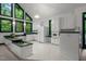 Well-lit kitchen features bright appliances and striking green trim at 224 Crawford Rd, Hillsborough, NC 27278