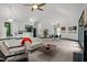 Bright living room with fireplace, kitchen bar and an open concept at 224 Crawford Rd, Hillsborough, NC 27278