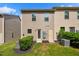 Well-maintained townhouse backyard with patio and green space at 246 Spark St, Raleigh, NC 27606