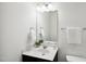 Clean bathroom features a modern vanity, a large mirror and a toilet at 246 Spark St, Raleigh, NC 27606
