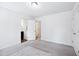 This bright bedroom offers natural light and plush carpeting at 246 Spark St, Raleigh, NC 27606