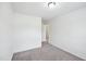 Neutral bedroom provides plush carpeting and an ensuite bathroom at 246 Spark St, Raleigh, NC 27606