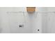 Bright laundry room with hookups and a shelf at 246 Spark St, Raleigh, NC 27606