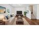 Cozy living room with hardwood floors, a comfortable sofa, and stylish decor at 246 Spark St, Raleigh, NC 27606