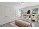 Relaxing main bedroom with carpet, neutral tones, and natural light at 246 Spark St, Raleigh, NC 27606