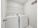 Laundry room with white washer and dryer at 256 Summer Ranch Dr, Fuquay Varina, NC 27526