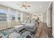 Open-concept living room showcases hardwood floors and a view to the modern kitchen at 256 Summer Ranch Dr, Fuquay Varina, NC 27526