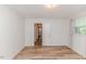 Bedroom featuring hardwood floors, window and white walls at 2619 Steel Bridge Rd, Sanford, NC 27330