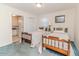 Bedroom with two beds, closet and window with curtains at 2619 Steel Bridge Rd, Sanford, NC 27330