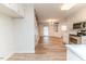 Open kitchen showcasing white cabinets, stainless steel appliances and access to the backyard at 2619 Steel Bridge Rd, Sanford, NC 27330