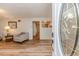 Open-concept living room showcasing hard surface flooring, neutral walls and lots of natural light at 2619 Steel Bridge Rd, Sanford, NC 27330