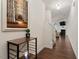 Welcoming foyer featuring hardwood floors, a console table, and a view into the living area at 270 Wembley Dr, Clayton, NC 27527