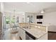 Spacious kitchen featuring granite countertops, stainless steel appliances, and an open layout at 270 Wembley Dr, Clayton, NC 27527