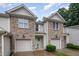 Lovely townhouse with stone details, spacious garages, and a well-maintained lawn at 2822 Pickett Rd # 173, Durham, NC 27705