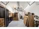 This bright garage has speckled flooring, ample storage, and a unique bicycle hoist system at 2822 Pickett Rd # 173, Durham, NC 27705