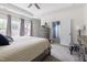Main Bedroom with neutral carpet, tray ceiling, wooden furniture and large windows at 306 Crossland Dr, Chapel Hill, NC 27517