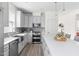 Well-equipped kitchen with a spacious island, stainless steel appliances, and ample counter space at 306 Crossland Dr, Chapel Hill, NC 27517