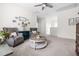 Upstairs Living Room featuring neutral carpet, ceiling fan, bookshelves and comfortable armchairs at 306 Crossland Dr, Chapel Hill, NC 27517