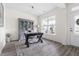 Bright office with a large window, stylish desk, and ample storage space at 306 Crossland Dr, Chapel Hill, NC 27517