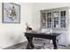 Comfortable office with natural light, a desk, chair and attractive shelving at 306 Crossland Dr, Chapel Hill, NC 27517