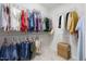 Spacious walk-in closet with ample shelving, hanging space, and a woven basket at 306 Crossland Dr, Chapel Hill, NC 27517