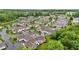 An aerial view of a serene community of charming homes at 306 Faith Dr, Gibsonville, NC 27249