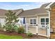Exterior shot of a home with a fenced-in backyard and patio at 306 Faith Dr, Gibsonville, NC 27249