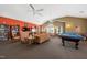 Spacious clubhouse features a billiard table, bookshelves, and seating at 306 Faith Dr, Gibsonville, NC 27249