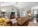 Inviting living room with vaulted ceiling, hardwood floors, and comfortable furnishings at 306 Faith Dr, Gibsonville, NC 27249