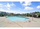 Inviting community pool surrounded by lounge chairs, perfect for relaxation and enjoying sunny days at 306 Faith Dr, Gibsonville, NC 27249