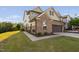 Beautiful two-story home with brick and siding, attached garage, and well-maintained lawn at 310 Alamosa Pl, Cary, NC 27519