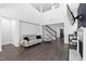 Open living room featuring high ceilings, modern decor, and seamless flow at 310 Alamosa Pl, Cary, NC 27519