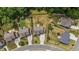 Aerial view of the neighborhood with houses, yards, and community layout at 3122 Jones Lake Rd, Fuquay Varina, NC 27526