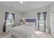 Bright bedroom featuring neutral walls and a window providing ample natural light at 3122 Jones Lake Rd, Fuquay Varina, NC 27526