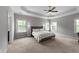 Serene main bedroom with neutral tones, ample natural light, and ceiling fan at 3122 Jones Lake Rd, Fuquay Varina, NC 27526