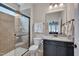 Bathroom featuring vanity, shower, and mirror at 316 Ibis Ln, Durham, NC 27703