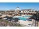 Resort-style community pool with a zero entry, cabanas, a clock tower and sun loungers for relaxation at 316 Ibis Ln, Durham, NC 27703
