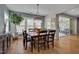 Cozy dining room with natural light, stylish decor, and hardwood floors for comfortable dining at 316 Ibis Ln, Durham, NC 27703