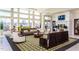 Spacious lobby features high ceilings, a cozy fireplace, ample seating, and large windows at 316 Ibis Ln, Durham, NC 27703