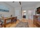 Open office space with hardwood floors, perfect for remote work or creative pursuits at 316 Ibis Ln, Durham, NC 27703
